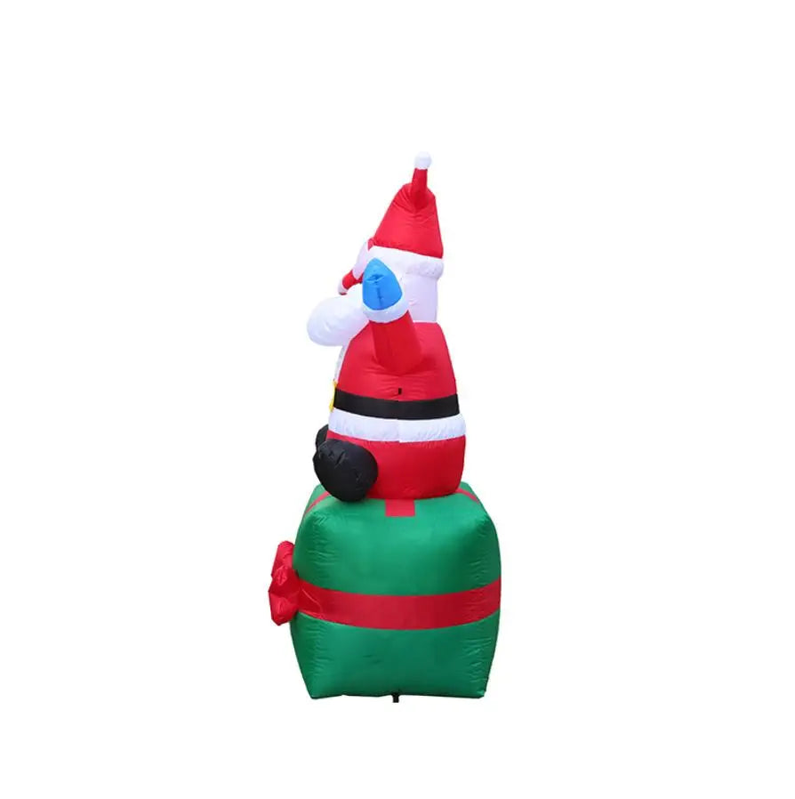 Inflatable Santa Claus Sitting on Gift (6 ft)