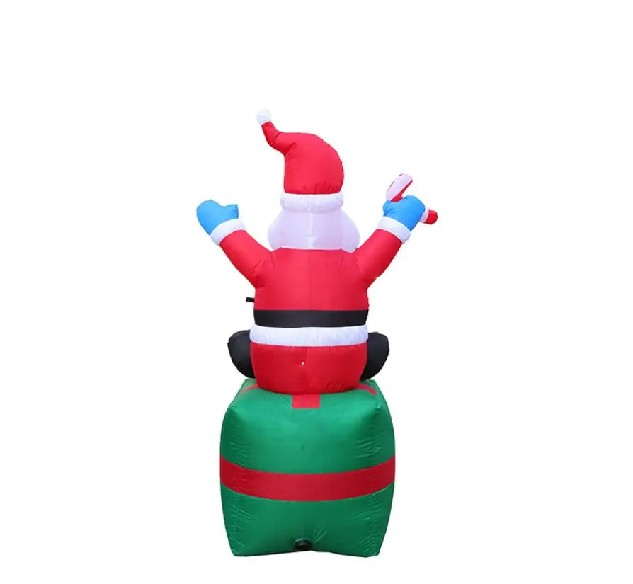 Inflatable Santa Claus Sitting on Gift (6 ft)